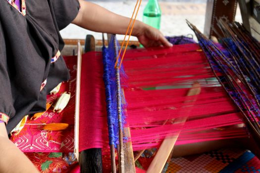 Handwoven vibrant textiles in West Nusa Tenggara, highlighting traditional craftsmanship.